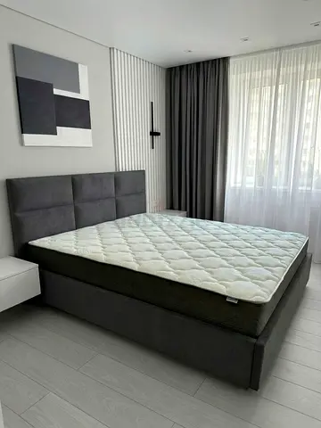 Gray Upholstered Bed Frame with Headboard and Mattress - Modern Design