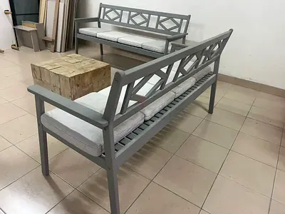 Garden benches from IKEA made of durable acacia wood in gray.