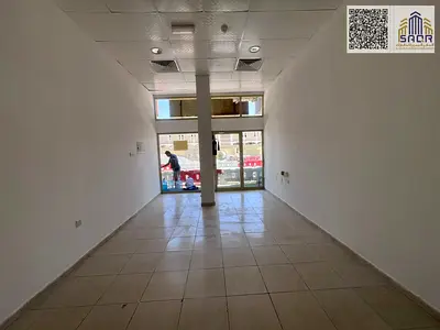 Spacious commercial shop available in a strategic and prime location suitable for various business activities The shop features an excellent frontage