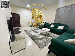 Furnished two-bedroom apartment with a living room and a balcony with an open view, Al Rashidiya 3