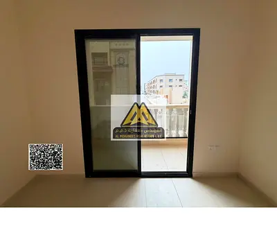 First-tenant studio with balcony and central AC in Al Alia, Ajman. AED 22,000 in 4 installments. Prime location near Sharjah and Dubai, maintenance by