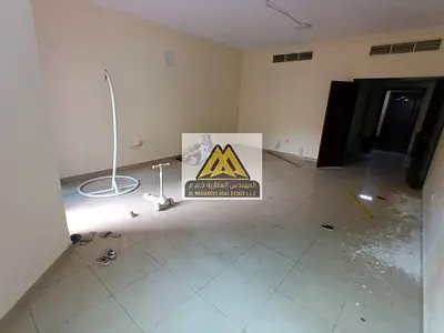 Very spacious two-bedroom apartment with a living room and a maid's room for rent in Al Nuaimiya Towers, Ajman – exceptional view and space