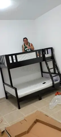 Solid wood bunk bed (twin over full) in good condition