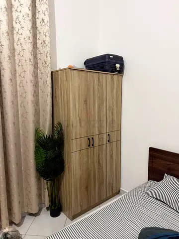Two-door wooden wardrobe / armoire in good condition
