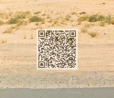 Commercial residential lands for sale in Al Aamra, Ajman, priced at AED 2.1 million per land in a prime main road location.