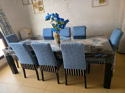 8-Seater Modern Marble-Top Dining Table with black Upholstered Chairs