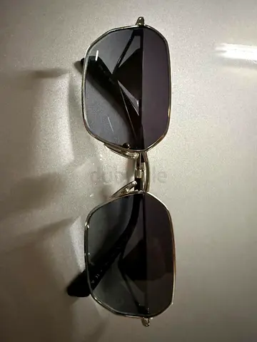 Prada Classic silver-frame sunglasses, lightly used