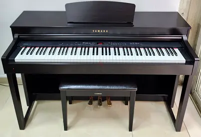 The Yamaha Clavinova CLP-430R (Rosewood) is a discontinued, high-quality digital piano from the