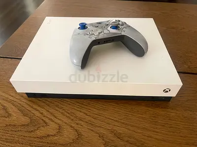 Xbox One X 1TB White console with controller  4 games