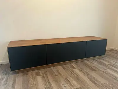Custom Built Floating Entertainment Center with LED Lighting and Textured Wall Panels