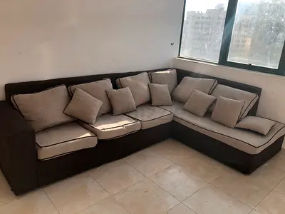 L-shaped 6-seater fabric corner sofa with cushions - good condition
