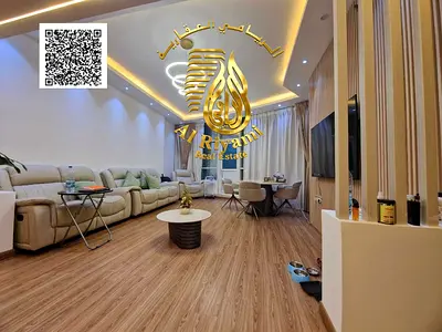 Own now a luxurious two-bedroom apartment with a terrace and panoramic views of Ajman Creek