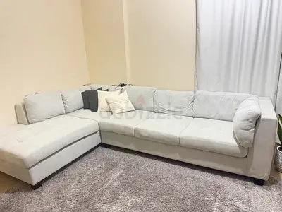 Light grey L-shaped sectional sofa - 3-seater with chaise and carpet