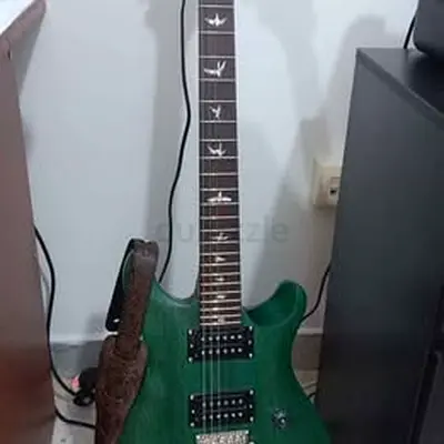 Green electric guitar - PRS-style double humbucker