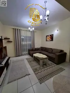 One bedroom and living room with balcony, monthly rent, behind Grand Mall, Rashidiya 3