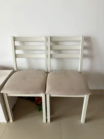 Set of 2 white wooden dining chairs with beige upholstered seats