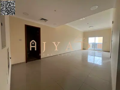 1BR hall for annual rent in Al Jurf 3. Master bedroom, 2 baths, central AC, balcony, wardrobes, eas
