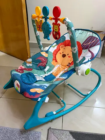 Baby rocker/bouncer seat with toy bar - gently used