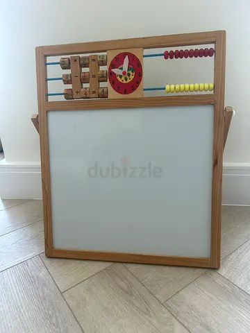 Two-in-one educational board. Whiteboard and chalkboard for children