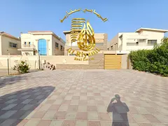 A luxurious villa with a European design and a prime and strategic location in Al Rawda, near Sheikh