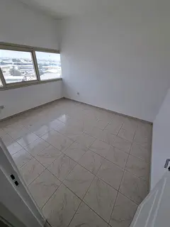 For annual rent in Sharjah – Abu Shagara area, Al Wahda Street, a well-maintained apartment consis