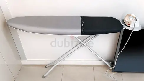 Ironing board with steam iron - good condition