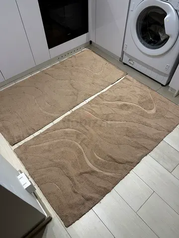 2 rugs brown