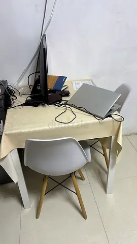 White rectangular dining table with 2 modern chairs — good condition