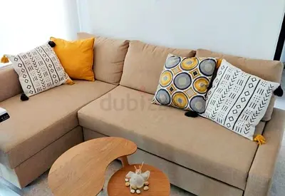 Beige L-shaped Sofa-bed Ikea with Storage - Good Condition