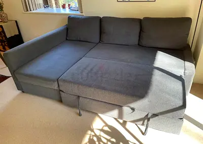 Grey L-shaped Sofa Bed with Storage — Good Condition