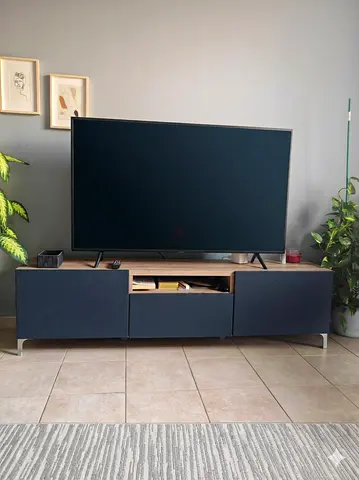 Modern low TV entertainment unit with storage (dark blue/wood) - good condition