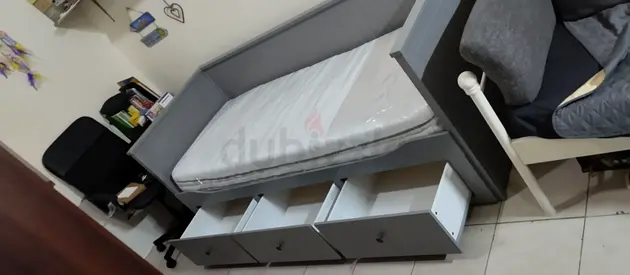IKEA hamnes day bed with 3 big storage drawers underneath and with 2 IKEA mattresses is available