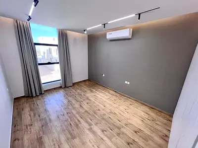 A two-story villa with a rooftop terrace, featuring Gree split air conditioning, a master bedroom, and a women's lounge.
