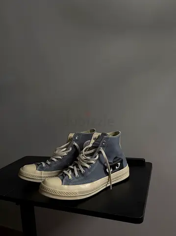 Grey high-top canvas sneakers, lightly used