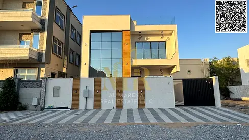 Luxury villa for sale in Al Helio 2 | 3014 sq ft | Two floors + roof | 5 master bedrooms | Majlis and living room with washrooms | Modern kitchen | Ou