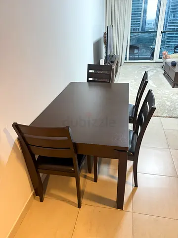Solid Dark Wood Dining Table with 4 Chairs - Good Condition