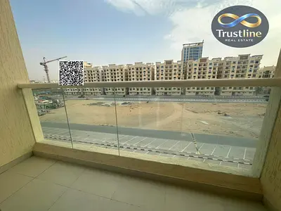 Studio apartment for sale in Al-Amira, B11. Features include a bathroom, built-in wardrobes, a balcony overlooking the garden, a swimming pool, a gym,