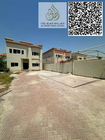 Villa for annual rent in Al Jurf 2. The villa consists of two floors with 5 bedrooms and a large living room, including 4 master bedrooms. The villa h
