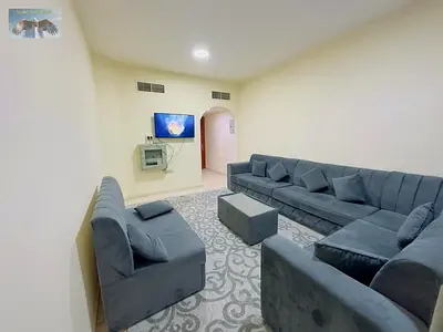 Two furnished bedrooms and a living room for rent on Al Ittihad Street in Ajman. Excellent location opposite Ramez Mall and close to Fashion Zone and