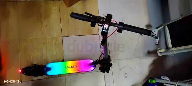 Electric scooter with rainbow deck lights — used, working