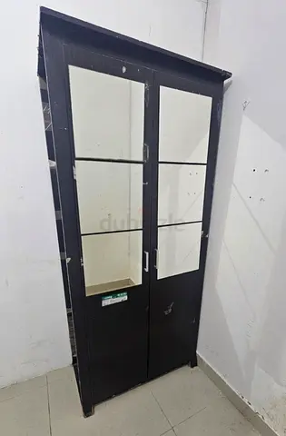 Used 2-door cabinet with drawers - 30Aed