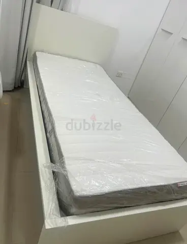Malam single  bed 90/200cm bed and Ikea mattress is available in excellent condition,