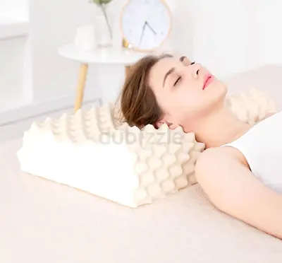 Thai natural latex pillow with rubber core, adjusts cervical spine and prevents mites.