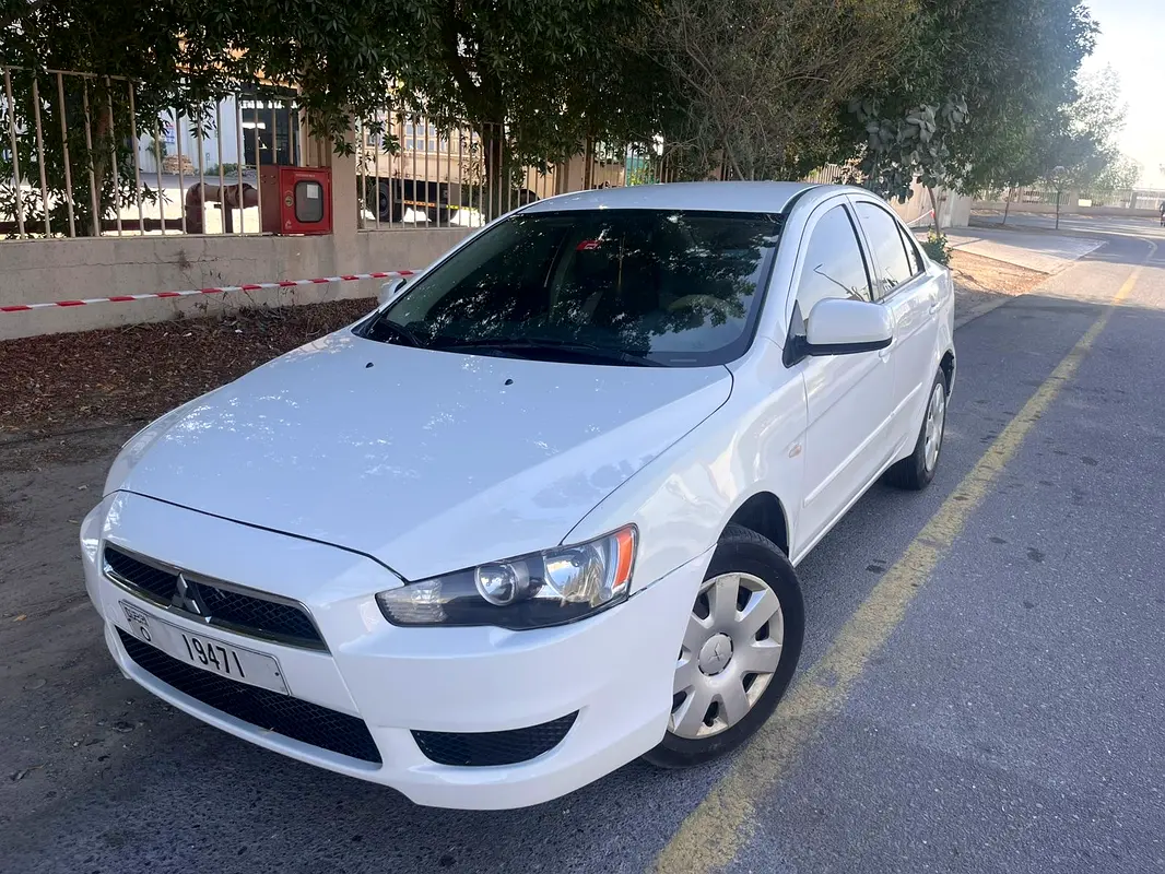 Mitsubishi Lancer EX 2011 — photo 1 of 7