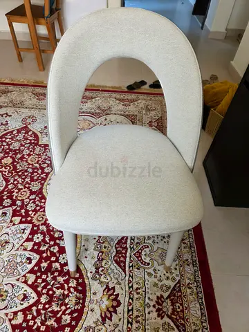 Modern upholstered chair — light grey two-tone, good condition