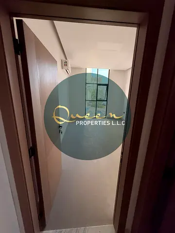 First tenant studio for annual rent on Ajman Corniche, featuring a spacious layout, separate kitchen, and excellent finishing for AED 25,000 with AED
