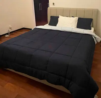 King bed with upholstered headboard and mattress (very good condition) 2 storage drawers on bedside