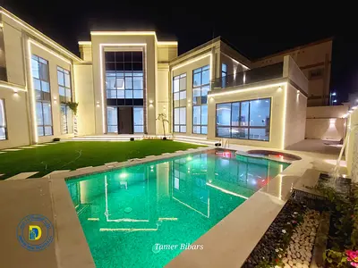 In Al Yasmin, a luxurious 10,300 sq ft villa for those with discerning tastes, featuring 6 bedrooms, a swimming pool, and a gym. Electricity, water,AC