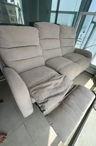 Light grey 3-seater reclining sofa in good condition
