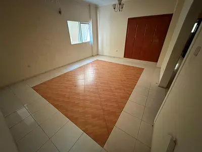 Elegant and beautiful two-bedroom apartment with a living room for annual rent in Al Qasimia area.
